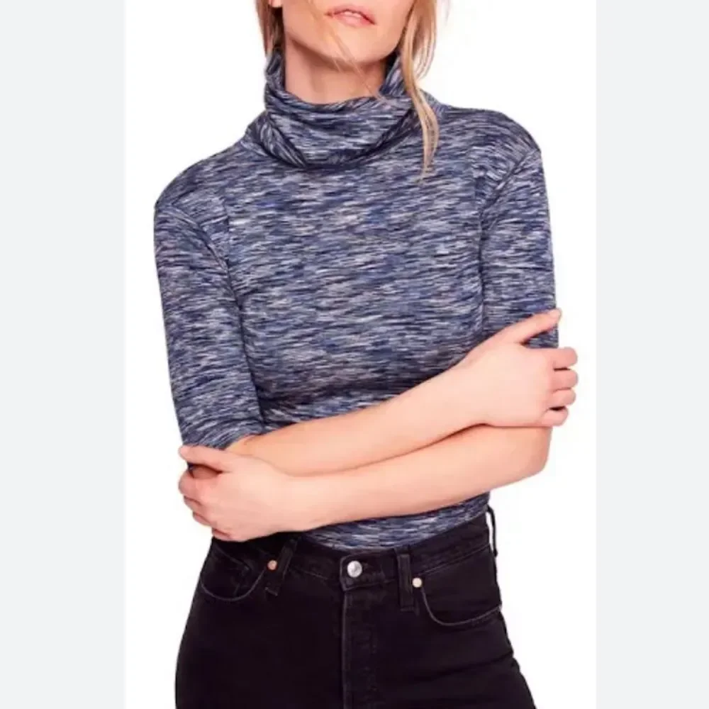 Free People Women Sunshine Space Dyed Turtleneck black & white size med. EUC!